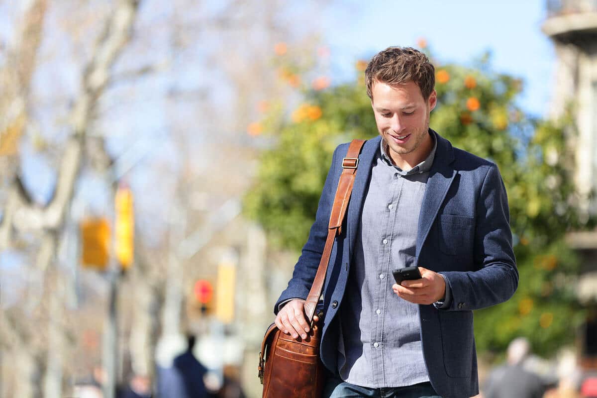 webaholics app development guy on phone